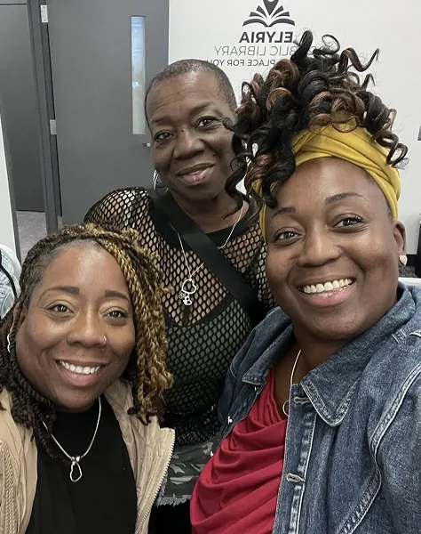 Tieshia Henry with clients